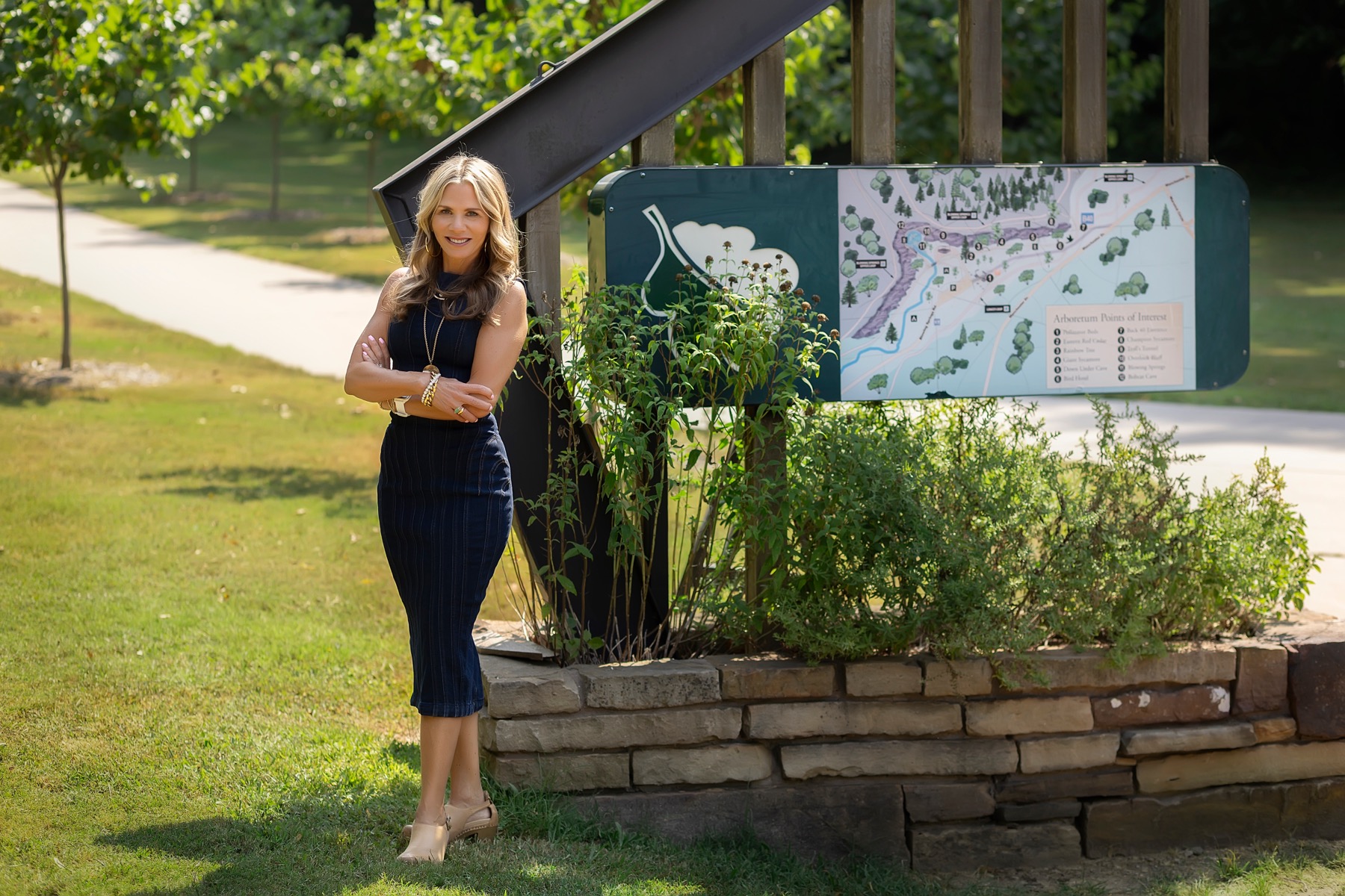 Nancy Orum at the Bella Vista arboretum entrance